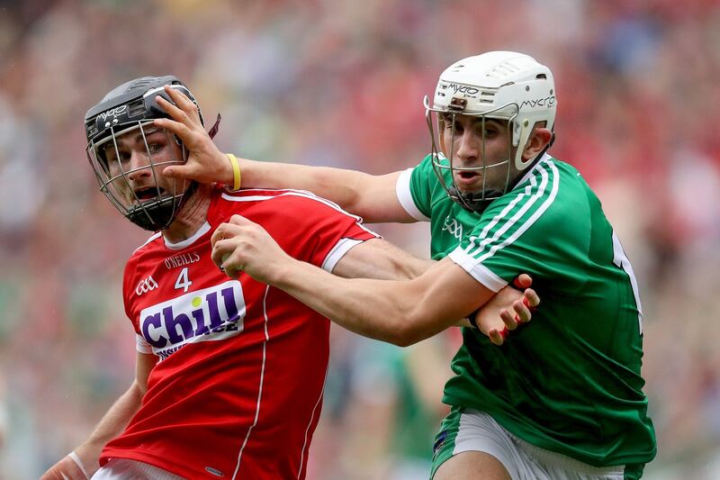 Limerick's Aaron Gillane with Colm Spillane of Cork. Photograph: Oisin Keniry/Inpho