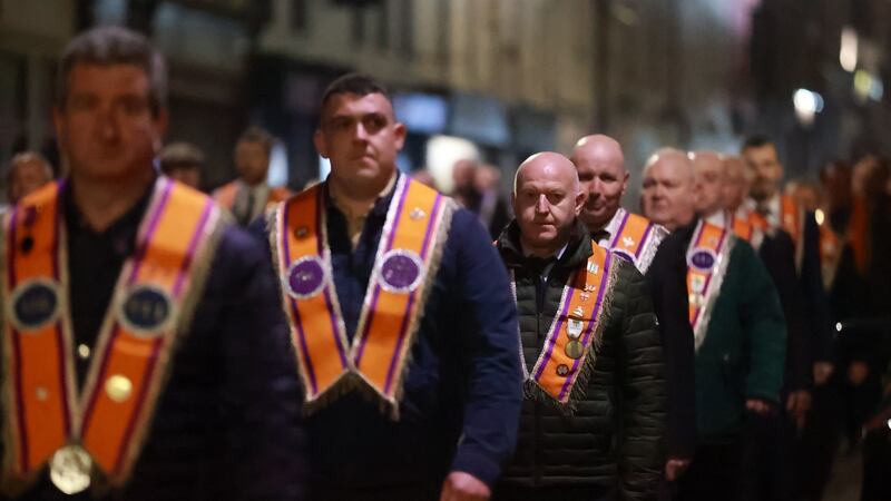 Orangemen march during the Ballymoney rally against the  Northern Ireland Protocol on Friday night. Photograph: Liam McBurney/PA Wire