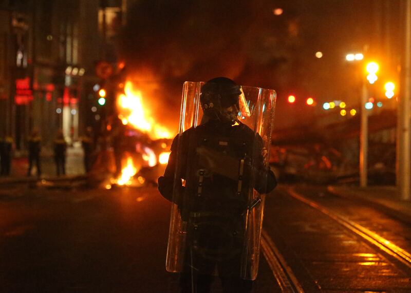 Dublin riot: Gardaí on O’Connell Street after violent scenes unfolded. Photograph: Stephen Collins/Collins