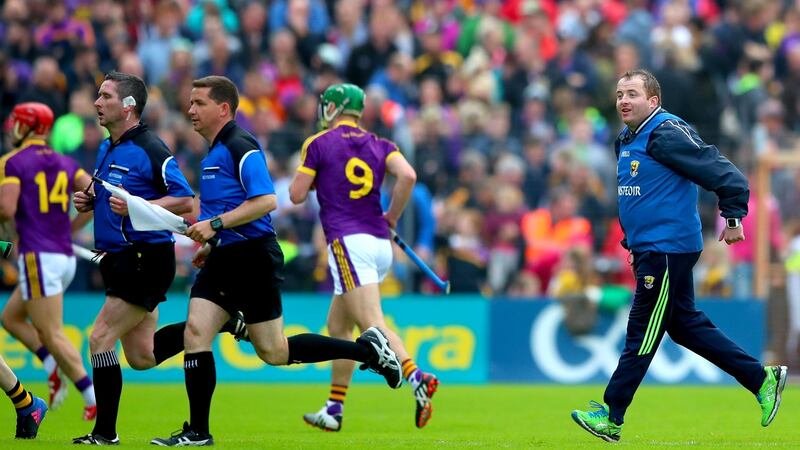 Wexford selector Saoirse Bulfin speaks to referee Fergal Horgan at half-time. Photograph: James Crombie/Inpho