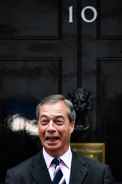 Nigel Farage at the door of 10 Downing Street in June 2019 to hand in a letter to British prime minister Theresa May. The letter detailed the Brexit Party's vision and demands for Brexit and asked for their party to be involved in Brexit negotiations. Photograph: Photograph: Jeff J Mitchell/Getty Images