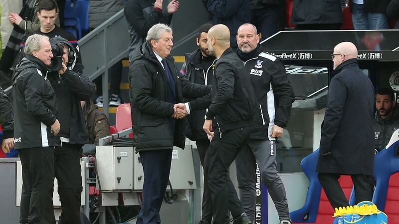 Roy Hodgson and Pep Guardiola shake hands after Crystal Palace’s goalless draw with Man City. Photograph: Steven Paston/PA