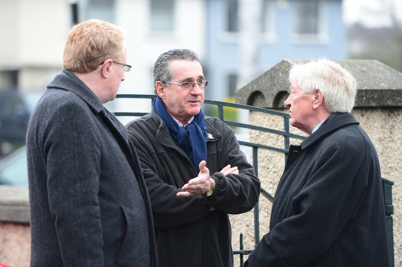 Michael O'Regan with sculptor Jarlath Daly and Mike Burns, former head of news RTÉ. Photograph: Alan Betson