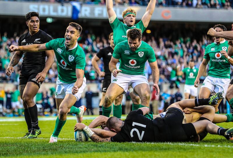 Ireland's Conor Murray celebrates Robbie Henshaw's try against New Zealand. Photograph: Billy Stickland/Inpho