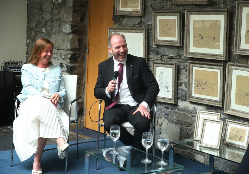 Ms Justice Tara Burns with artist Mike O'Donnell at the exhibition in the Distillery Building, Smithfield, Dublin. Photograph: Collins