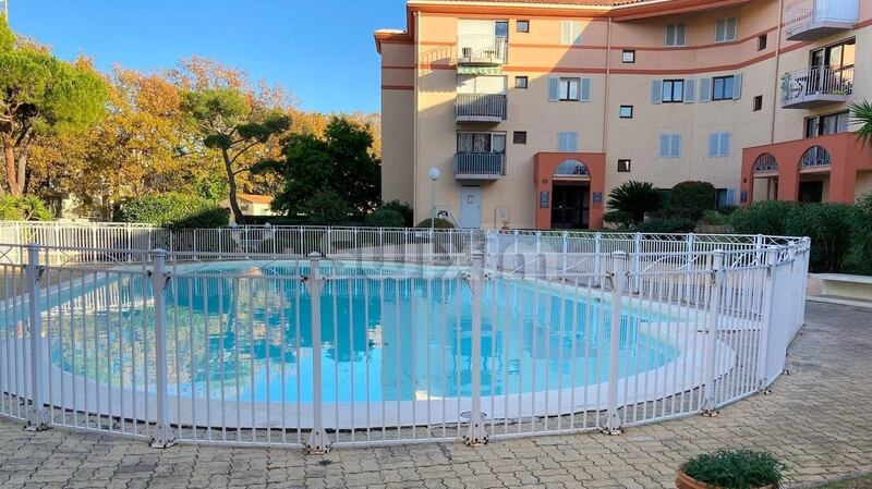 This one-bedroom apartment in Frejus is in a complex with a shared pool