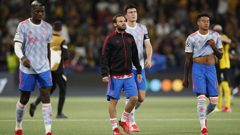 Paul Pogba, Juan Mata, Harry Maguire and Jesse Lingard react after losing their Champions League match against BSC Young Boys in Bern, Switzerland on Tuesday.  Photograph: Peter Klaunzer/EPA