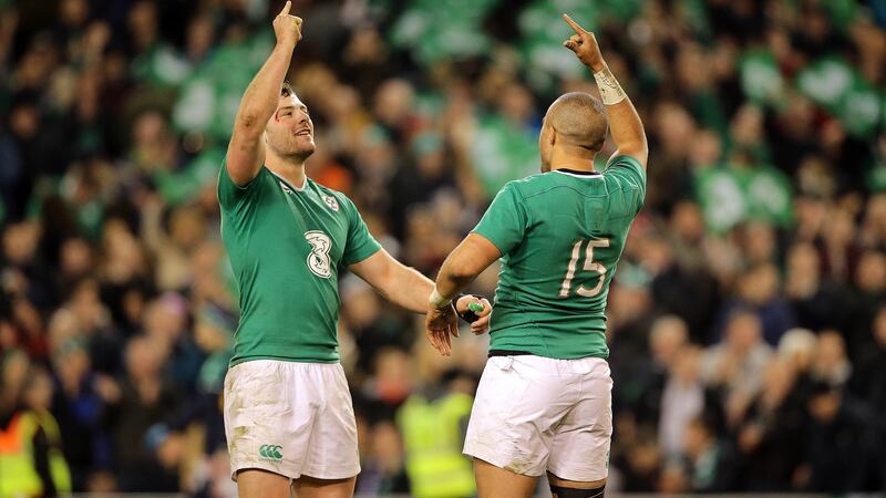 Simon Zebo and Robbie Henshaw celebrate the end of the game.
