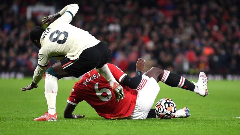 Liverpool’s Naby Keïta   Liverpool is fouled by Paul Pogba of Manchester United leading to a red card being shown following a VAR review. Photograph: Michael Regan/Getty Images