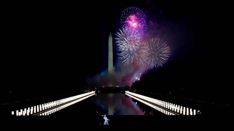 Singer Katy Perry performs in front of a firework display during the Celebrating America event at the Lincoln Memorial. Photograph: Joshua Roberts/Pool/AFP via Getty Images