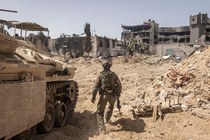 Israeli soldiers from Flotilla 13, a commando unit, on the grounds of Shifa Hospital in Gaza City. Photograph: Avishag Shaar-Yashuv/New York Times
                      