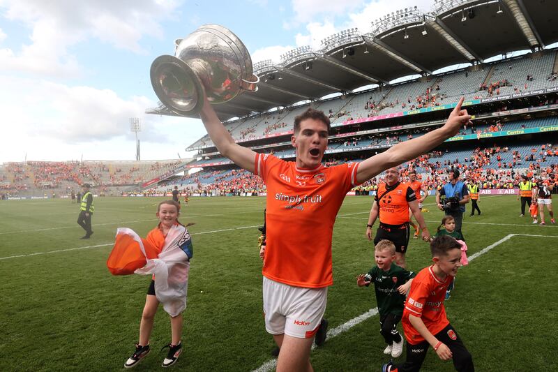 Armagh's Jarly Óg Burns celebrates after the game. Photograph: Bryan Keane/Inpho