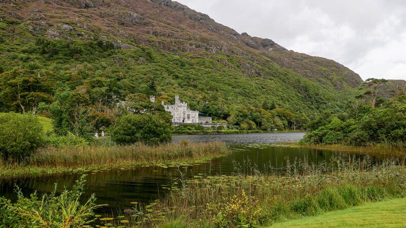 Kylemore Abbey, a Benedictine Monastery built on the grounds of Kylemore Castle, by Pollacappul Lough. Photograph: Betend A/ Andia/ Universal Images Group via Getty Images