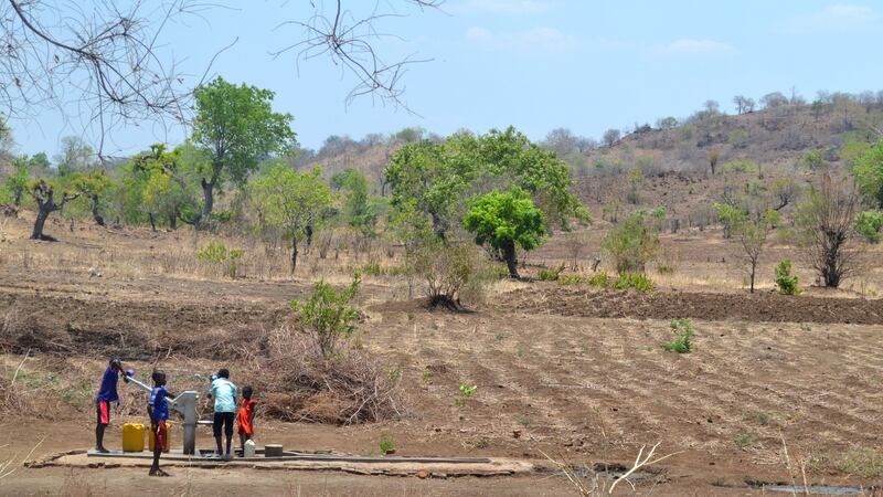 Children at a water pump in Chikwawa in the Southern Region,  Malawi.