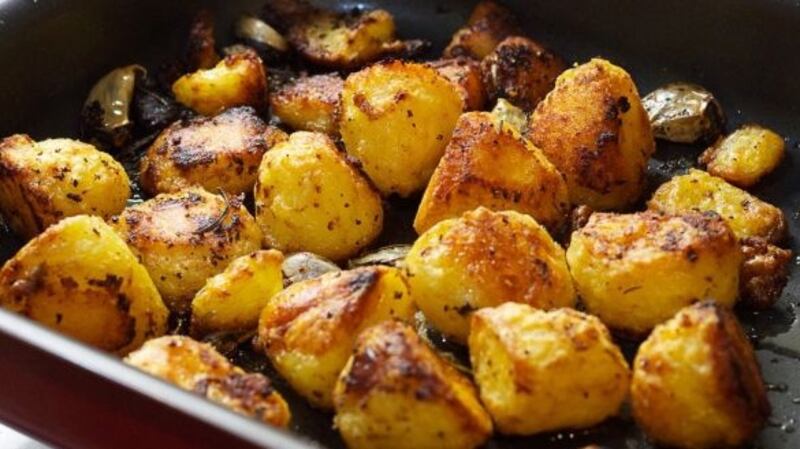Potatoes roasted in goose fat, with garlic and thyme.