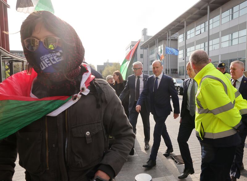 Taoiseach Micheál Martin is greeted with protesters on his arrival at DCU. Photograph: Alan Betson