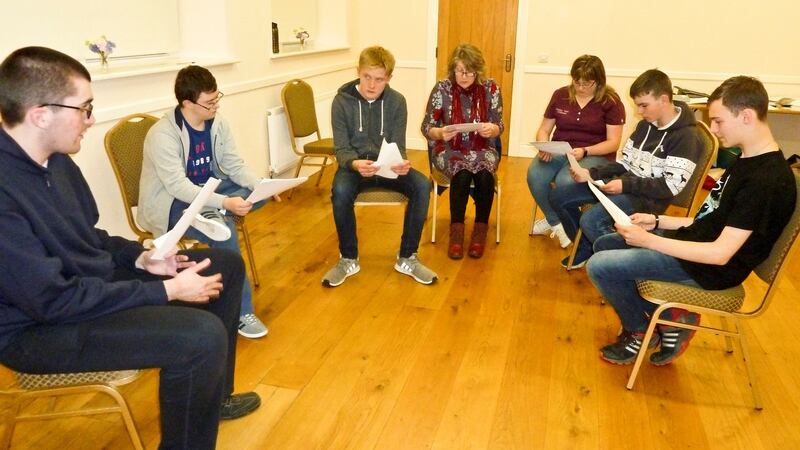 The group reading their lines, along with drama facilitator Maura Williamson. Photograph: Tony Fahy