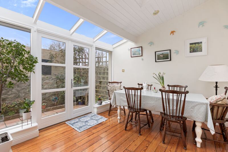 French doors open out to a small but private patio that backs on to the Royal Hospital in Donnybrook