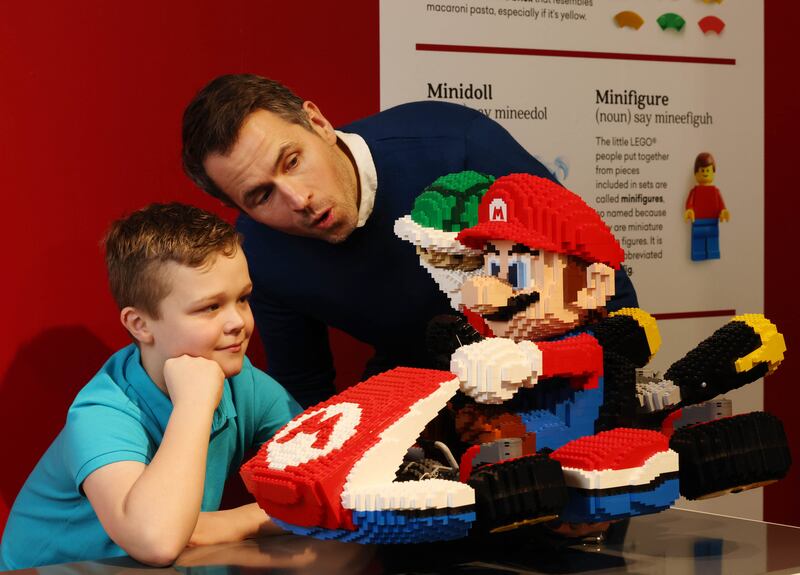 Finn Ryan and Kieran Cuddihy with  a Super Mario sculpture. Photograph: Leon Farrell/Photocall Ireland