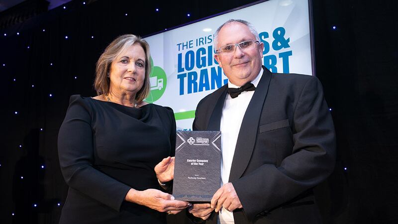 Dr. Jane O’Keeffe, Awards Judge, presents the Courier Company of the Year award to Mark van Niekerk, Fastway Couriers.