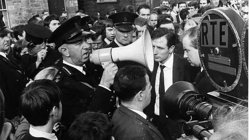 William Meharg, a senior policeman, warns the demonstrators on the Derry civil rights march on October 5th, 1968 that any attempt to march along the prohibited route was illegal and would be resisted. Photograph: The Irish Times