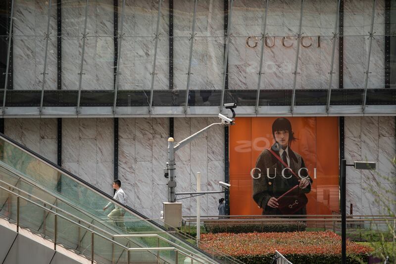 A Gucci store at IFC mall, an upscale shopping center in Shanghai, in April this year. The government has outlined spending programmes to encourage consumers to spend as it moves to a new economic model. Photograph: Qilai Shen/The New York Times
                      