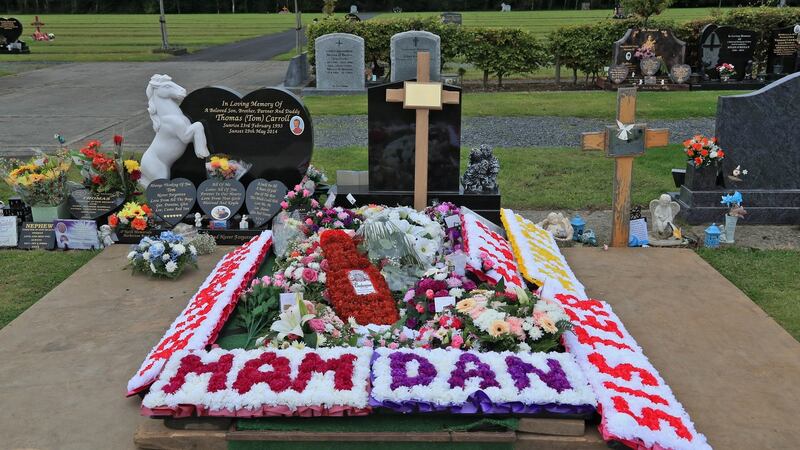 The grave of 27-year-old Danielle Carroll adorned with crêpe paper floral wreaths. Photograph: Colin Keegan/Collins Dublin
