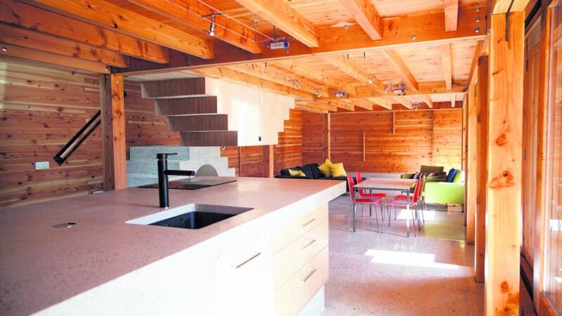 The kitchen and living room have polished concrete floors. Photograph: Paul Quinn