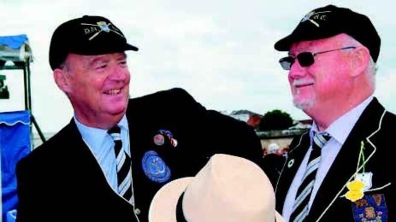 The author, left, and John Macken sharing a laugh.
