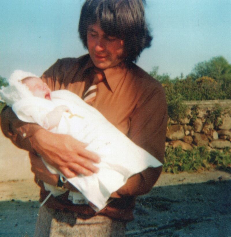 Mick McHugh holding his baby daughter Deirdre. Photograph: Courtesy of the McHugh family 
