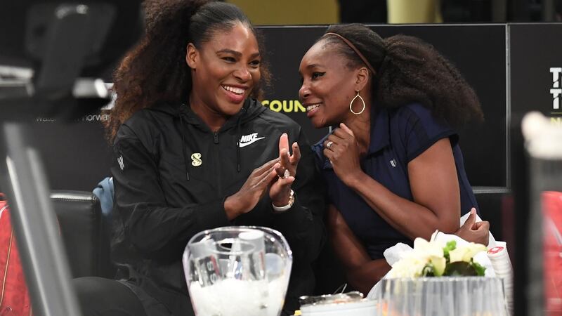 Serena Williams and Venus Williams in New York. Photograph: Timothy A Clary/AFP