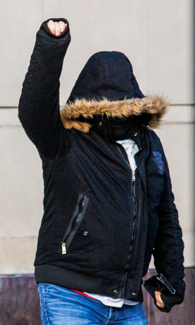 James Smyth celebrating as he leaves Belfast Crown Court after he was found not guilty of the murders of Catholic workmen Eamon Fox and Gary Convie in 1994. Photograph: Liam McBurney/PA Wire


