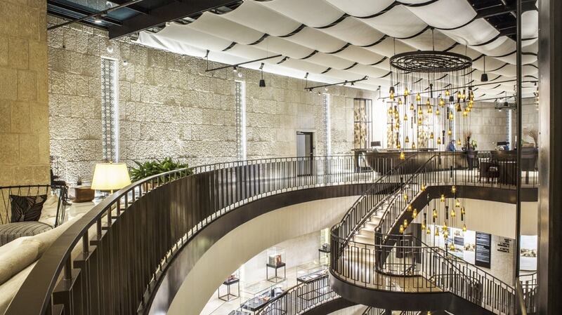 Hirsch Bedner Associates installed draped blinds to create a convex version of barrel vaults in the Orient Hotel Jerusalem.