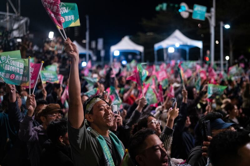 The crowd cheers at a Democratic Progressive Party rally in New Taipei City, Taiwan where frontrunner Lai Ching-te emerged victorious. Photograp: Louise Delmotte/AP