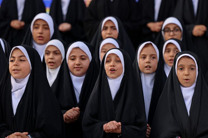 Iranian girls sing during a pro-hijab rally in Tehran last month. Photograph: Atta Kenare/AFP via Getty Images