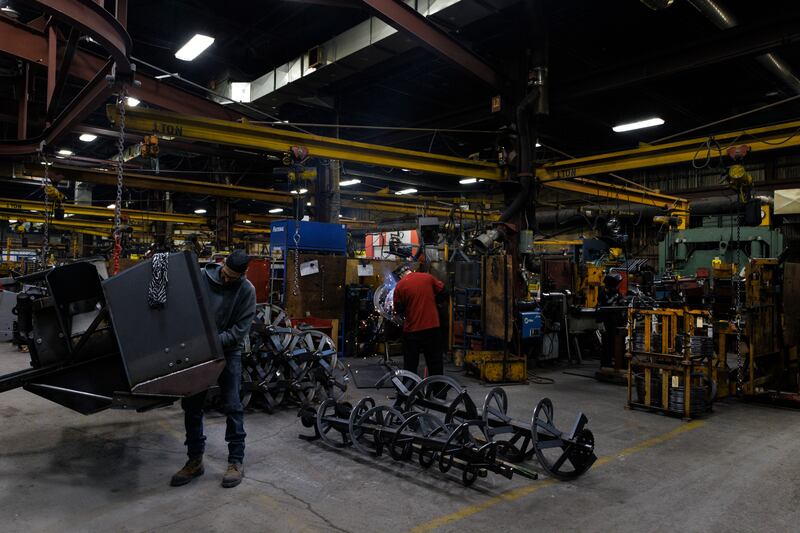 Factory workers at Les Machineries Pronovost, a snowblower factory, in St-Tite, Quebec, Canada. The need for skilled workers has increased as the company ramps up production. Photograph: Nasuna Stuart-Ulin/New York Times