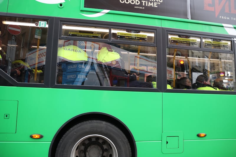 A bus carrying gardaí in Dublin city on Tuesday as preparations conditions for the US president's visit. Photograph Nick Bradshaw