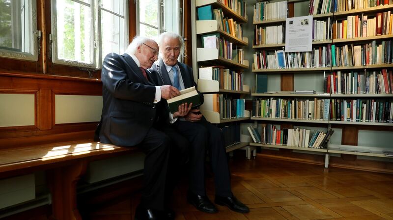 President Michael D Higgins speaking to Dr Fritz Senn, director of the James Joyce Foundation, during a visit to the foundation in Zurich, Switzerland. Photograph: Maxwell’s.