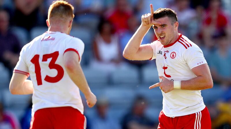 Tyrone’s Connor McAliskey celebrates after scoring his sides opening goal. Photograph: James Crombie/Inpho