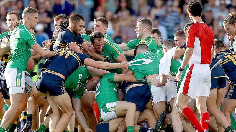 A fight breaks out between the two sides before half-time. Photograph: Tommy Dickson/Inpho
