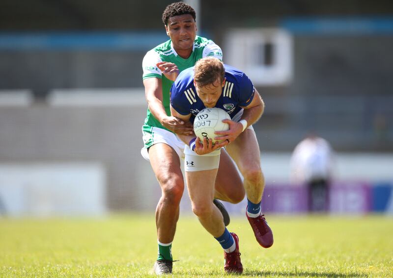 London's Joshua Obahor gets to grips with Kieran Lillis of Laois in last year's Tailteann Cup. Photograph: Leah Scholes/Inpho