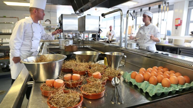 Preparation of Potato Espuma and Cured Egg, served on hay, at GMIT’s Galway campus. Photograph: Joe O’Shaughnessy