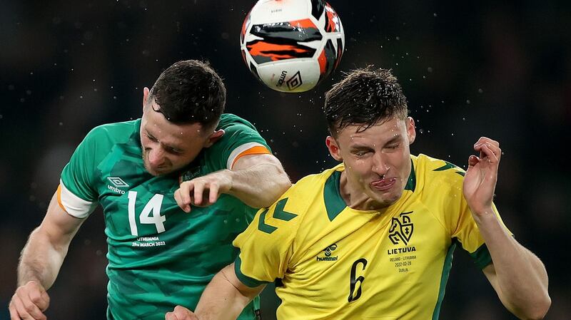 Ireland’s Alan Browne and Benas Satkus of Lithuania compete for the ball during the international friendly at the Aviva Stadium. Photograph: James Crombie/Inpho