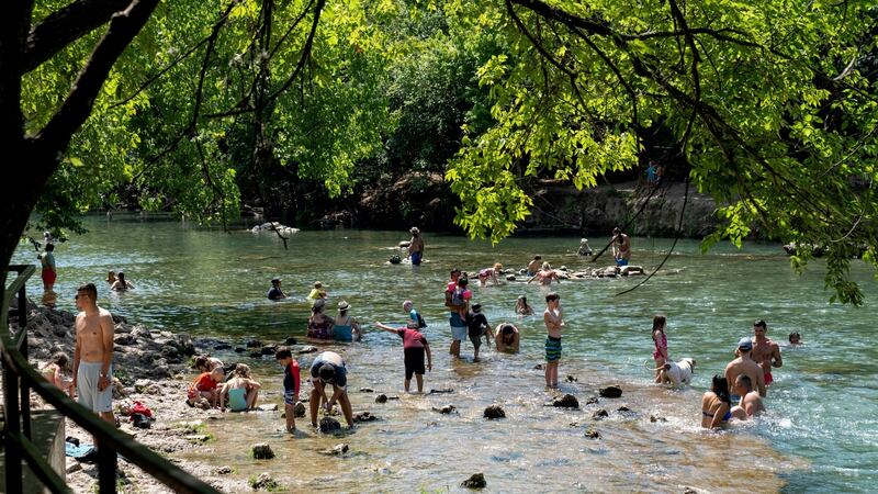 People cool off at Ladybird Lake in Austin, Texas, on June 17th. Photograph: Ilana Panich-Linsman/New York Times