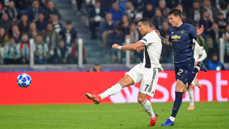 Juventus’ Cristiano Ronaldo scores against Manchester United. Photograph: Massimo Pinca/Reuters