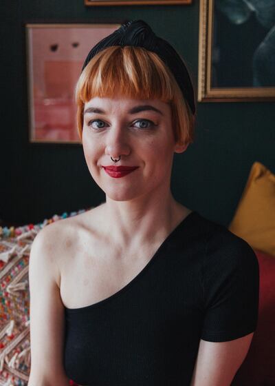 Shawna Scott: “Some days I love big shoulder pads and sequins; others I love dungarees and my bright red rubber rain boots.” Photo Credit Vanessa Ifediora