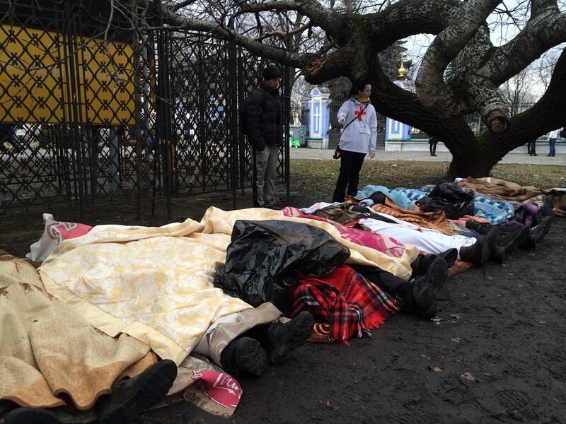 The bodies of several anti-government protesters shot dead on Kyiv's Maidan Square were brought to the grounds of St Michael's monastery on February 20th, 2014. Photograph: Daniel McLaughlin