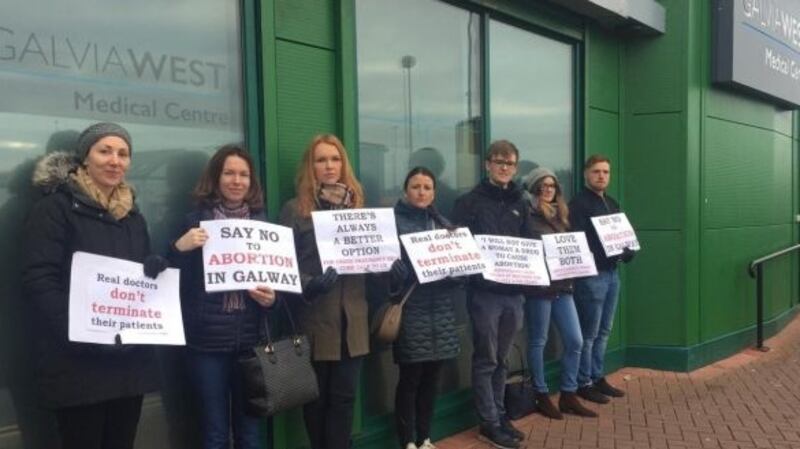 Anti-abortion protesters outside the Galvia West Medical Centre in Galway city.