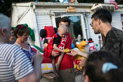 Brody looking at a toy that neighbours dropped off.