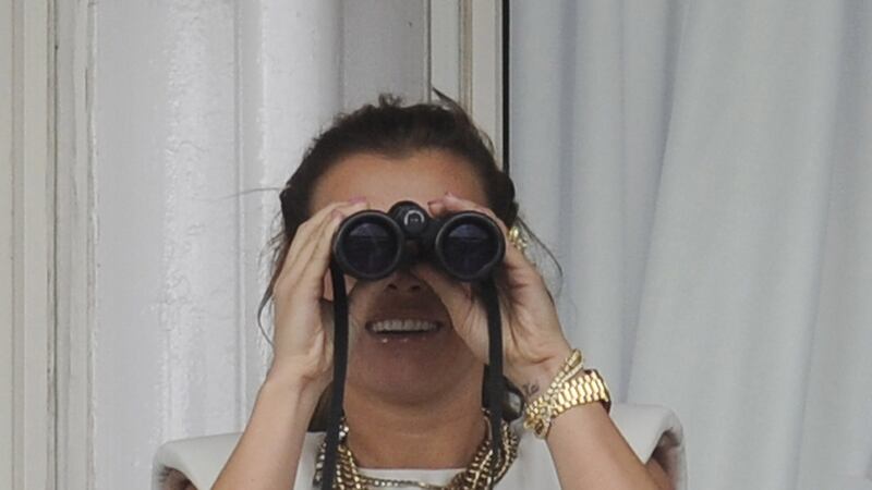 Coleen Rooney  aka ‘WAGatha Christie’. File photograph:  Alan Crowhurst/Getty CHESTER, ENGLAND - MAY 10:  Coleen Rooney watches the action through binoculars at Chester racecourse on May 10, 2012 in Chester, England. (Photo by Alan Crowhurst/Getty Images)